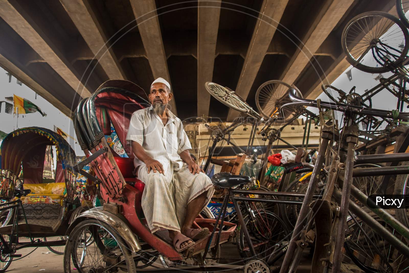 Rickshaw Puller Taking Rest. This Image Was Captured  On March-30-2021, From Dhaka, Bangladesh, South Asia