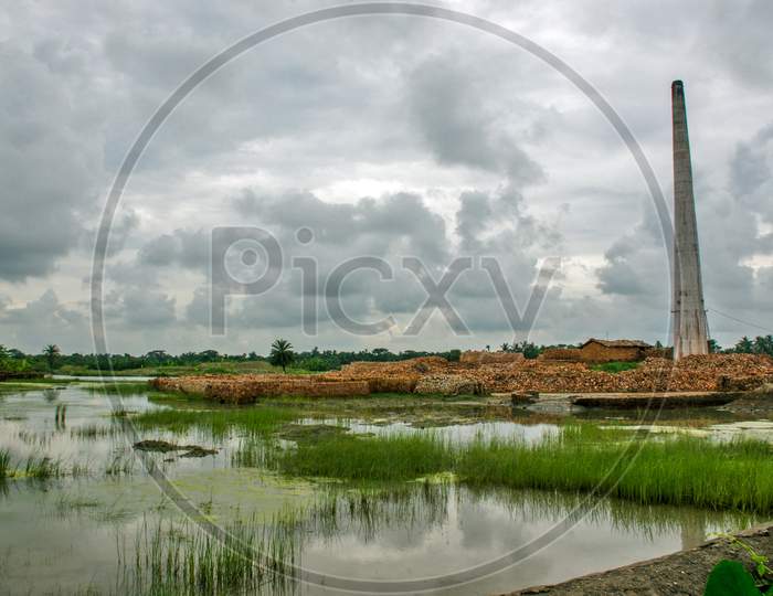brick kiln and monsoon cloudscape abstract photography