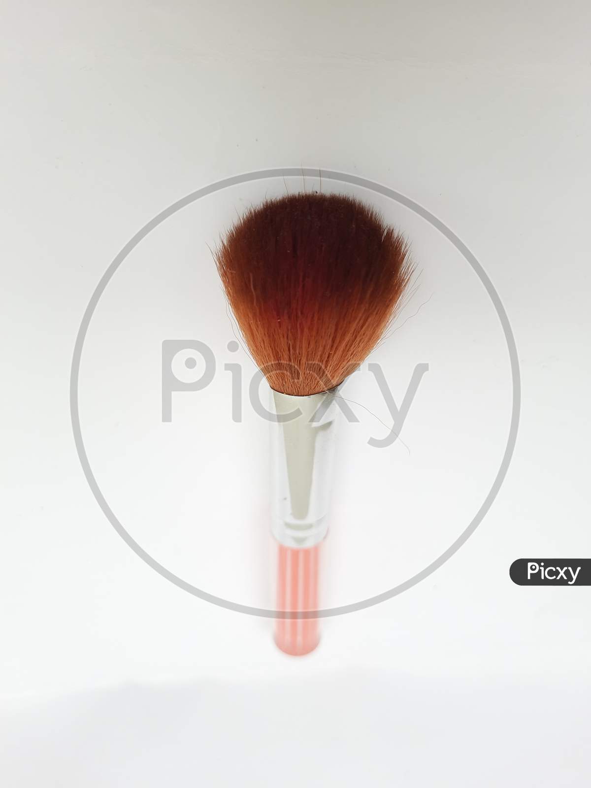 Single Pink Color Girl Or Women Makeup Brush Isolated On White Background