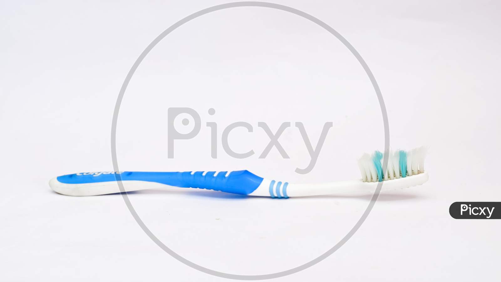 The Brush For Dental Care On A White Background.