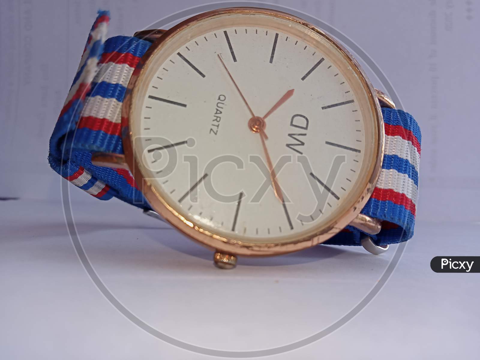 Analog watch with multi color strap