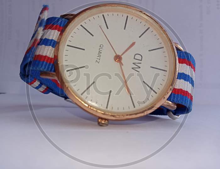 Analog watch with multi color strap