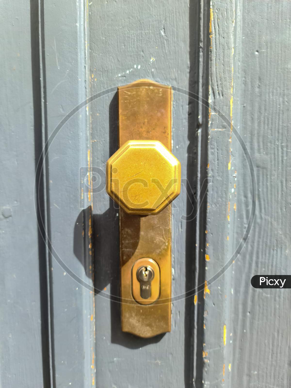 Close Up Of A Metal Lock At A Closed Door