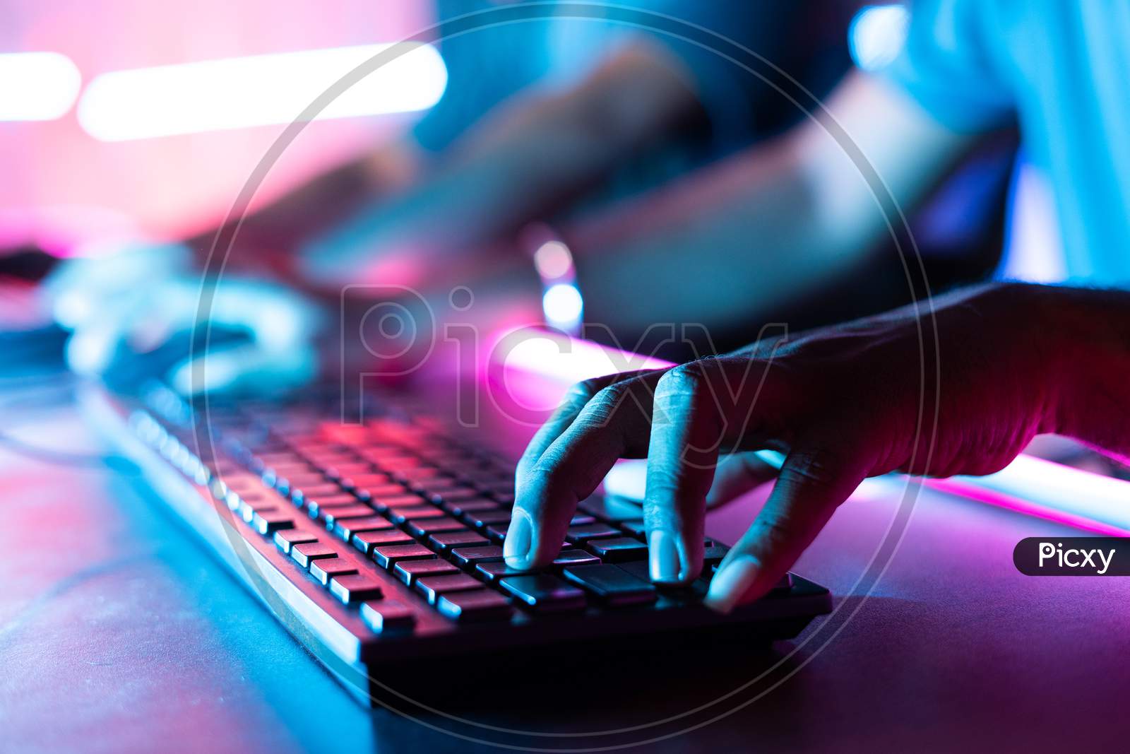 Focus On Fingers, Close Up Shot Of Online Professional Gamer Hands Hitting Keyboard In Fast While Playing At Game In Tournament