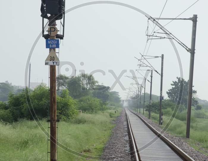 RAILWAY TRACK WITH LIGHT IN VERTICAL