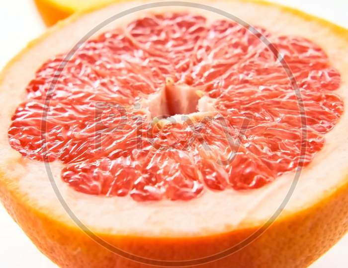 Fresh Grapefruit halves close-up isolated on the white background