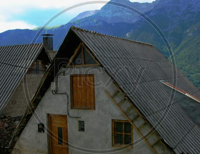 Beautiful typical house of the Aragonese Pyrenees, with its black roof and exaggerated slope