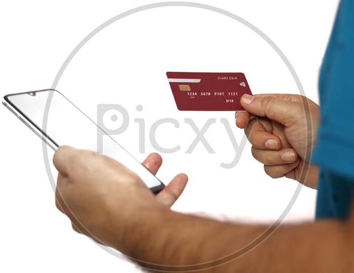 Online Payment,Man'S Hands Holding A Credit Card And Using Smart Phone For Online Shopping.