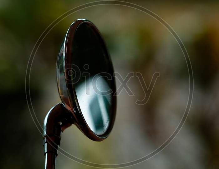 Rear View Mirror Of A Bullet