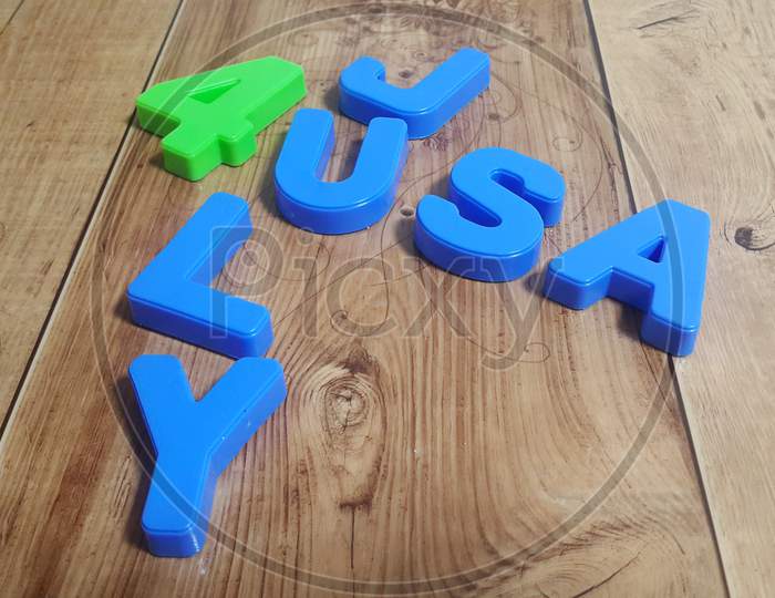 Plastic Colored Alphabets Making Words 4 July Usa Are Placed On A Wooden Floor