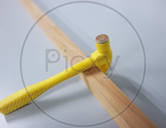 Selective Focused, Closeup View Of Toy Hammer Made From Plastic