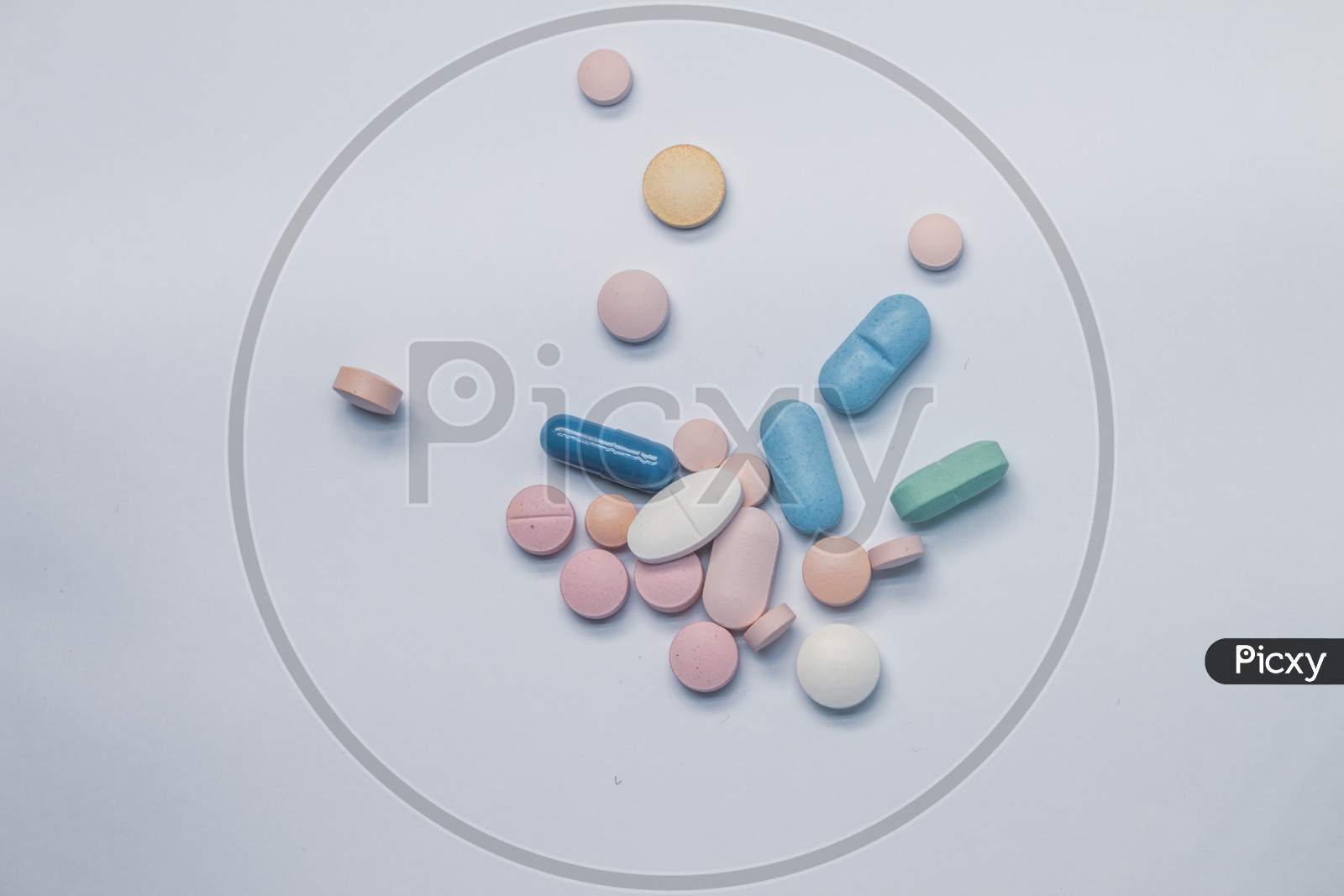 Numerous Colored Pills On A Neutral Background. Medicines For Use In Humans. Polypharmacy Concept.