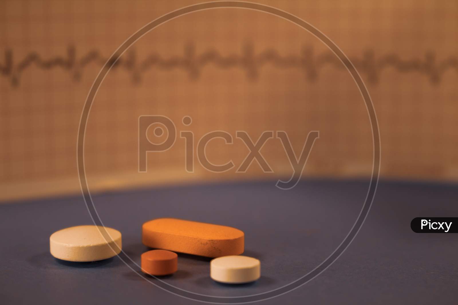 Numerous Colored Pills On Neutral Background. Medicines For Use In Humans.