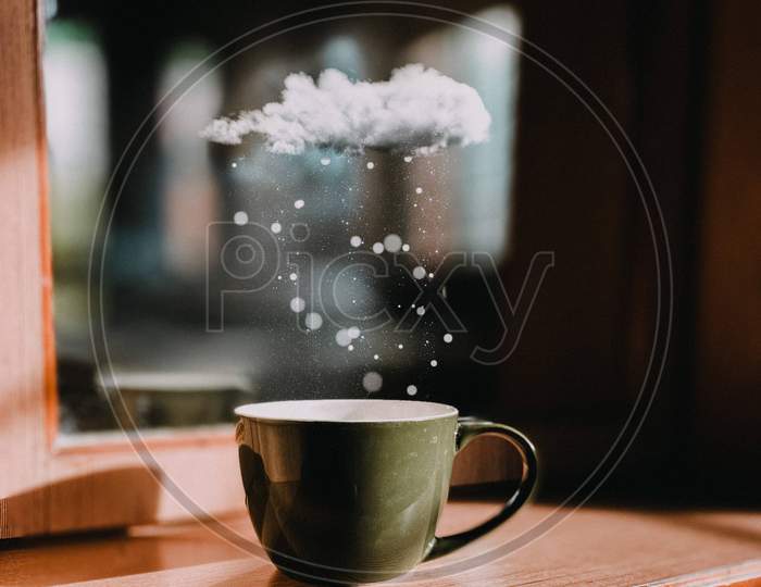 magical coffee cup and a snowfall cloud