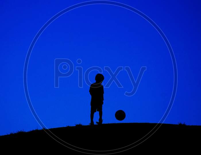 Boy Playing With Soccer Ball (Trimming)