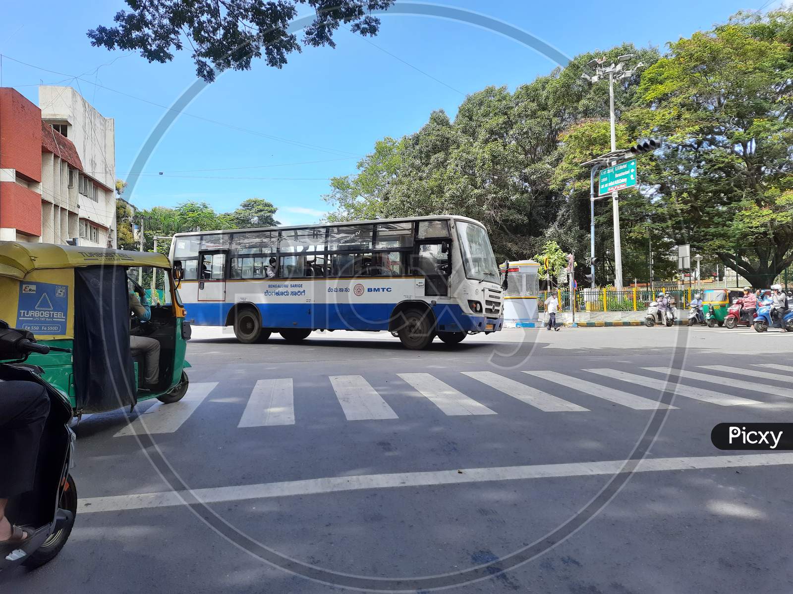 Closeup Of Bmtc Blue Bus Crossing The Road Of Netkallappa Circle, Near Basavanagudi Police Station, Kr Market Main Road