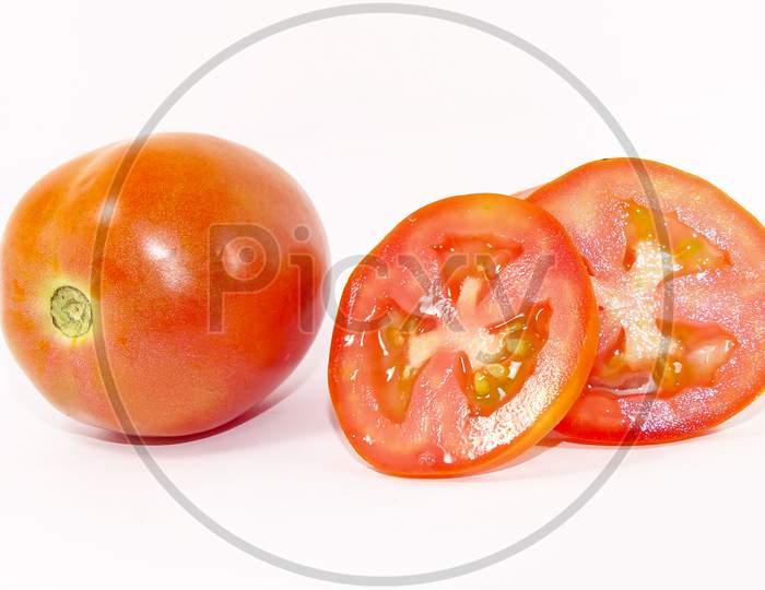 Slice of fresh tomato, isolated on white background