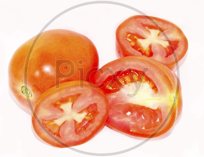 Slice of fresh tomato, isolated on white background