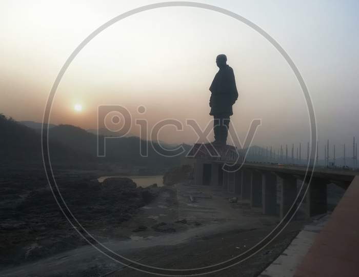 visitor capture sunrise view with worlds tallest statue i.e statue of unity at Kevadia Gujrat