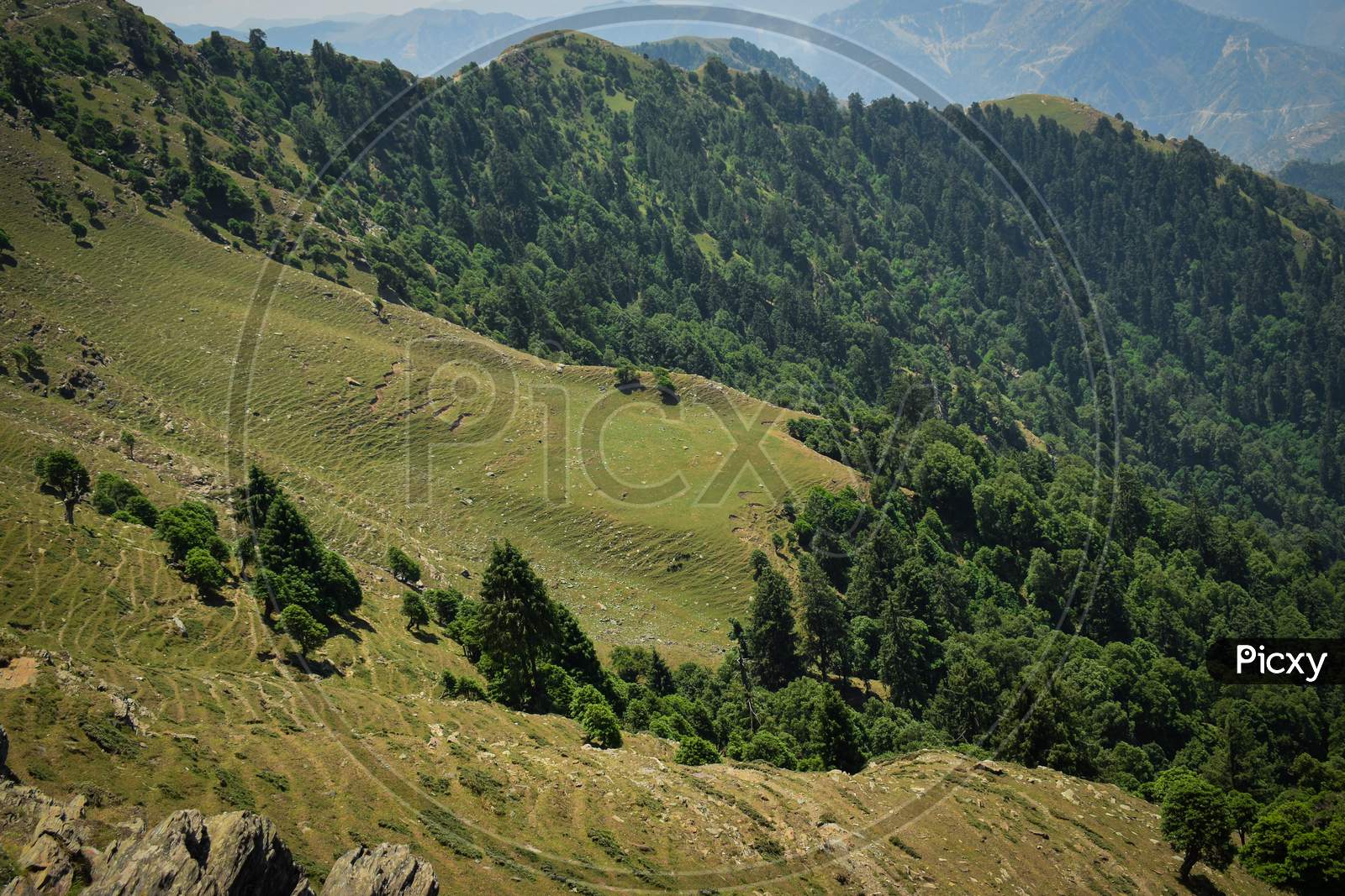 photograph of beautiful  landscape and  green mountains .