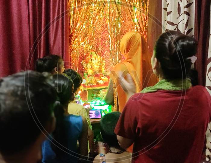 Hindu Devotees Immerse The Idols Of Lord Ganesha And Goddesss Gauri People pray to Lord Ganesh