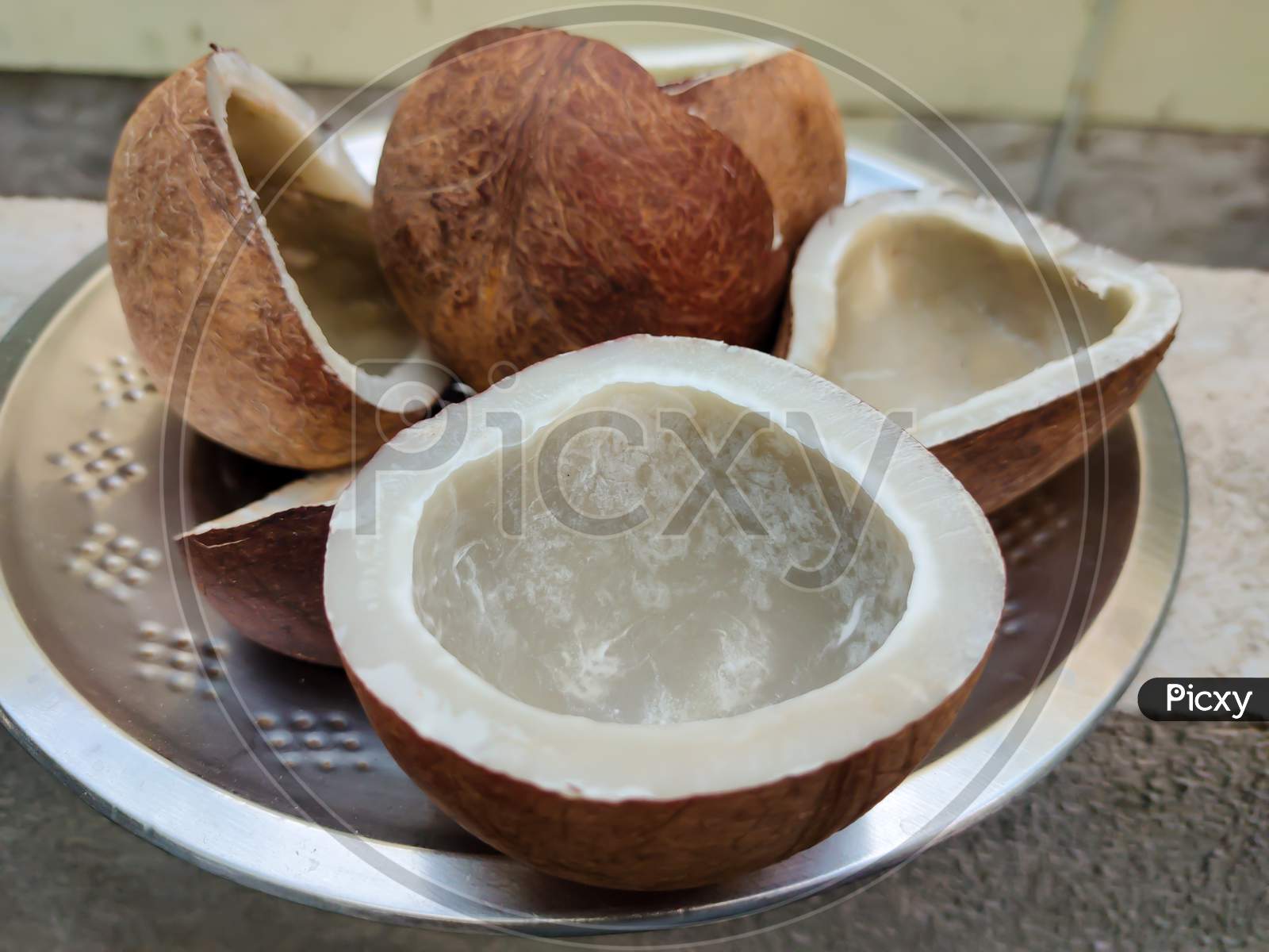 Brown dry coconut on the plate