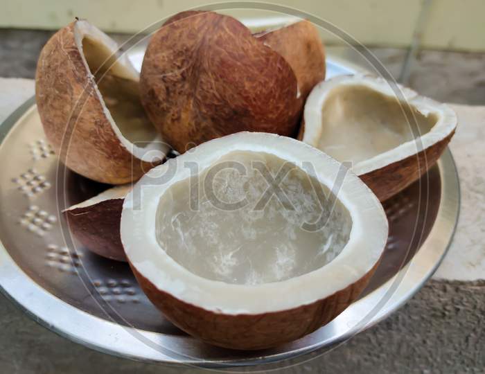 Brown dry coconut on the plate