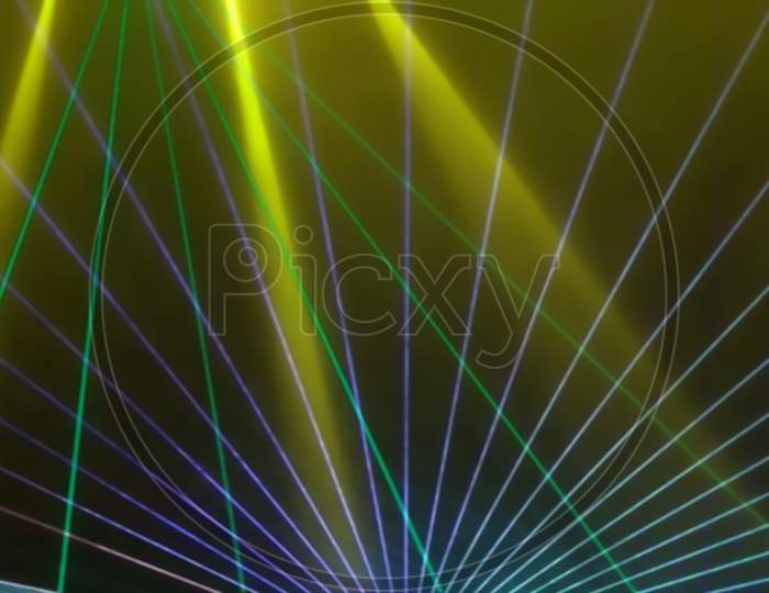 Colorful Anniversary Laser Show With Some Smoke In The Air. Party Background