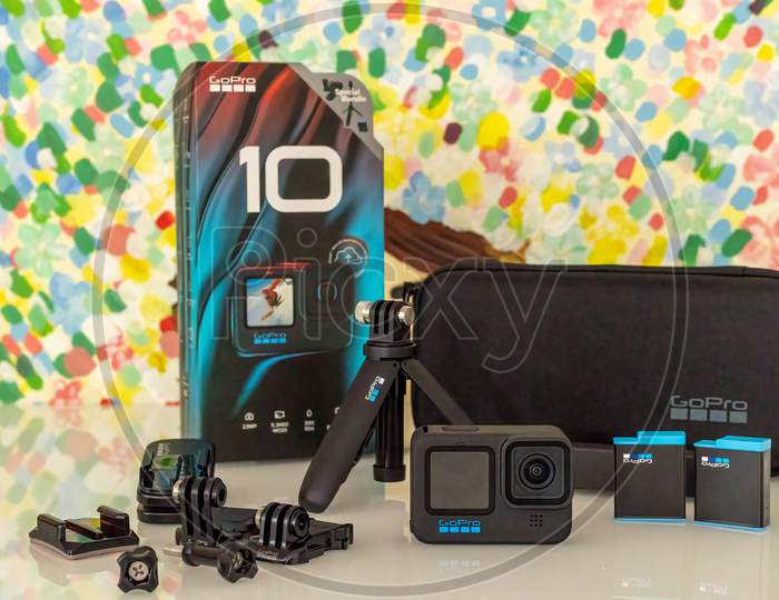 Frankfurt, Germany - 20th September 2021: A german photographer bought the all new GoPro Hero 10 action camera, unboxing the bundle with additional equipment.