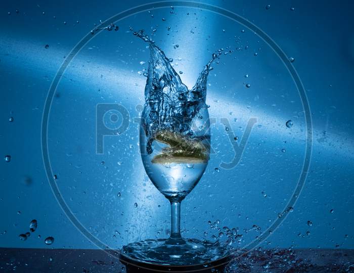 lemon drops in full of water glass