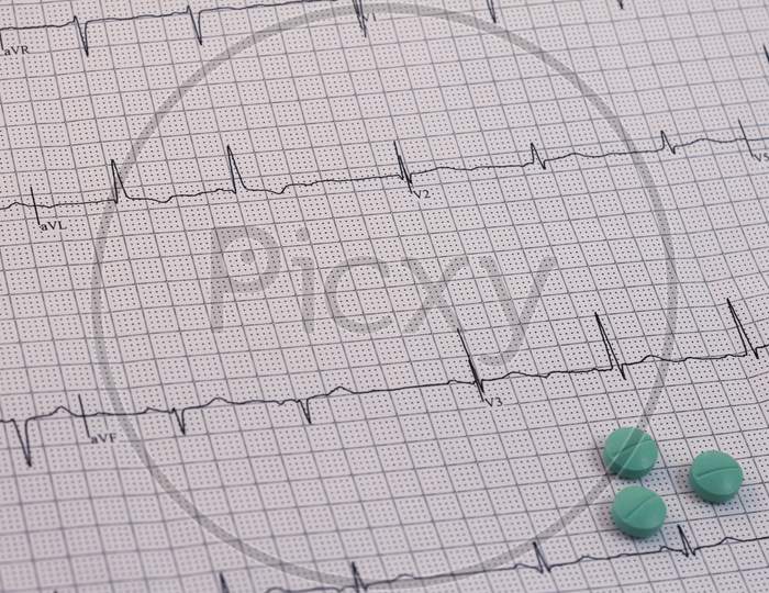 Ekg And Green Pills. Cardiovascular Control Concept.