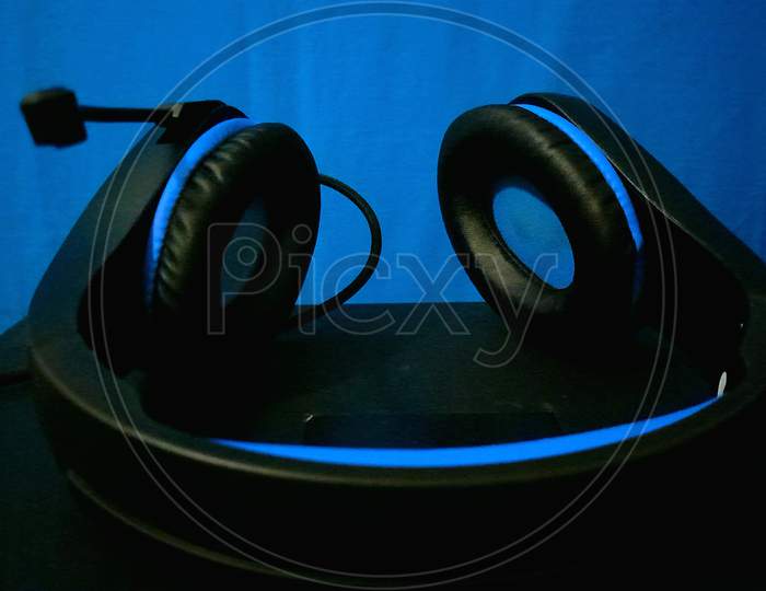 Blue Head phones with blue background