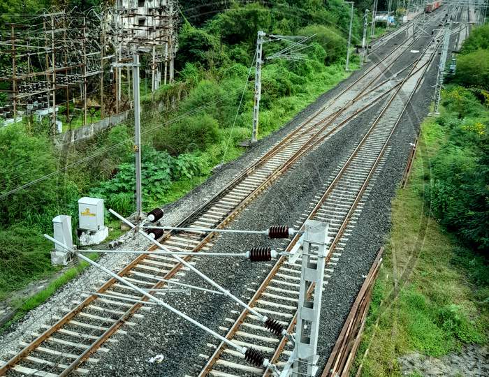 powergrid along railway track vertical image pic