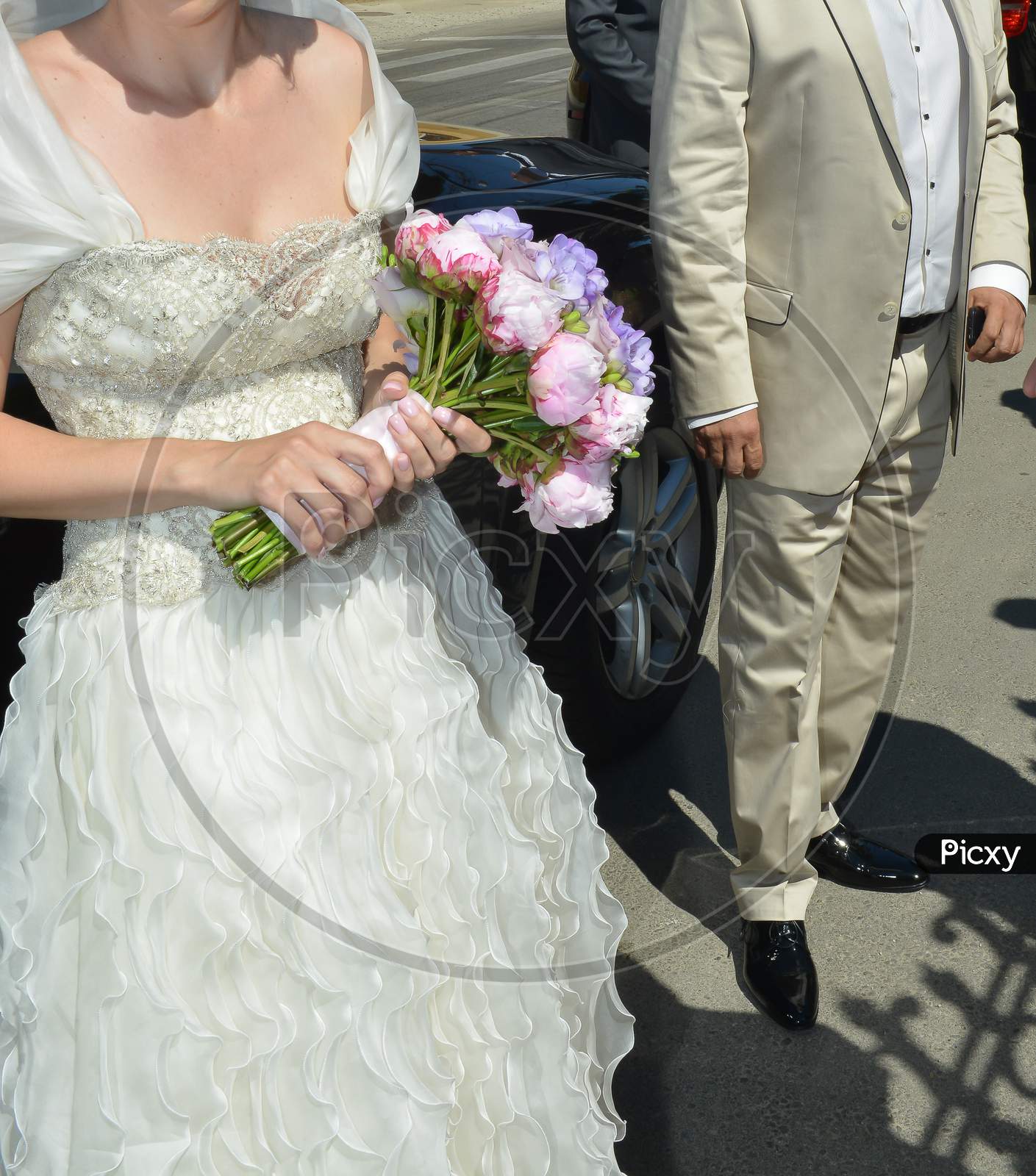 Wedding Bride Holding A Pink Flower Bouquet Outdoor