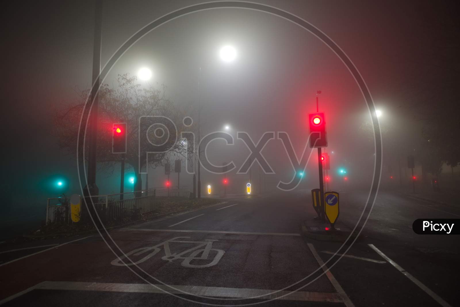 Extremely Foggy Night Time Conditions At A Junction Of Two B Roads
