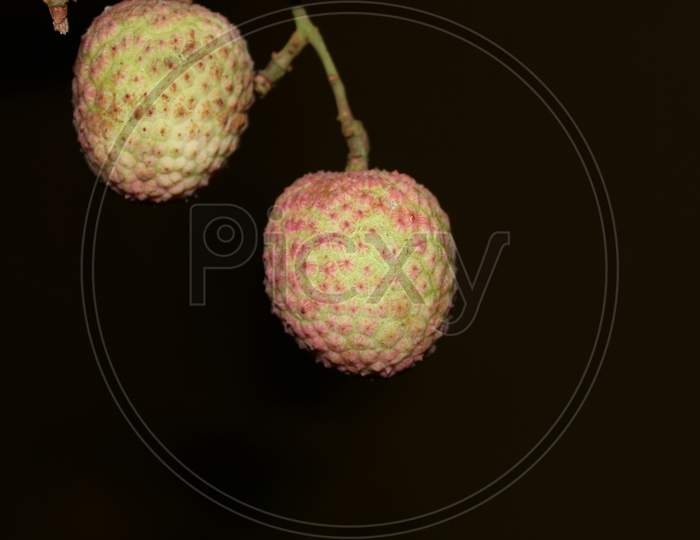 Lychee, Two Lychee Hanging With Sweet Tropical Fruit.