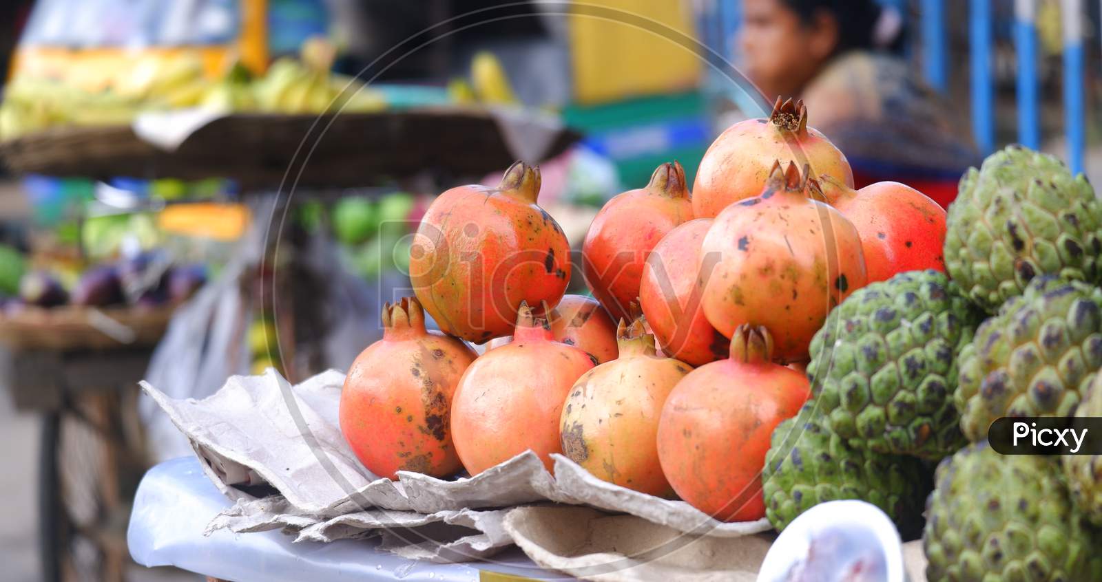 Close Image Of Fresh Pomegranate Being Sold On Road In India.