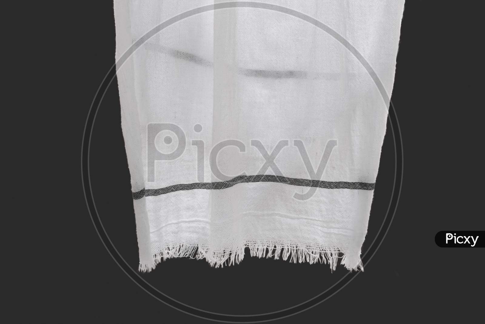 Kerala Bath Towel Or Thorthu With Black Line. Background Black And Selective Focus