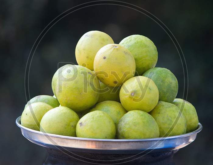 Heap Of Lemons In Plate