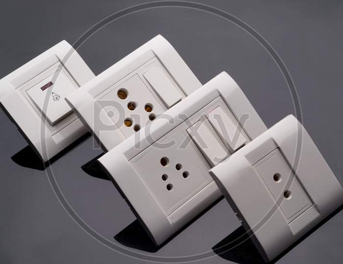 wall switch power electronic component socket different and modern realistic part | wall switch modular and plate in grey background