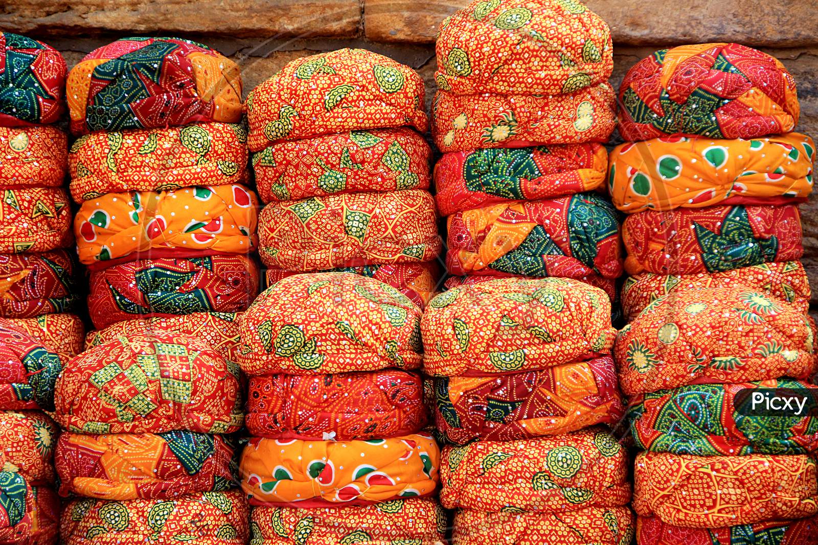 Stack Of Red Rajasthani Caps