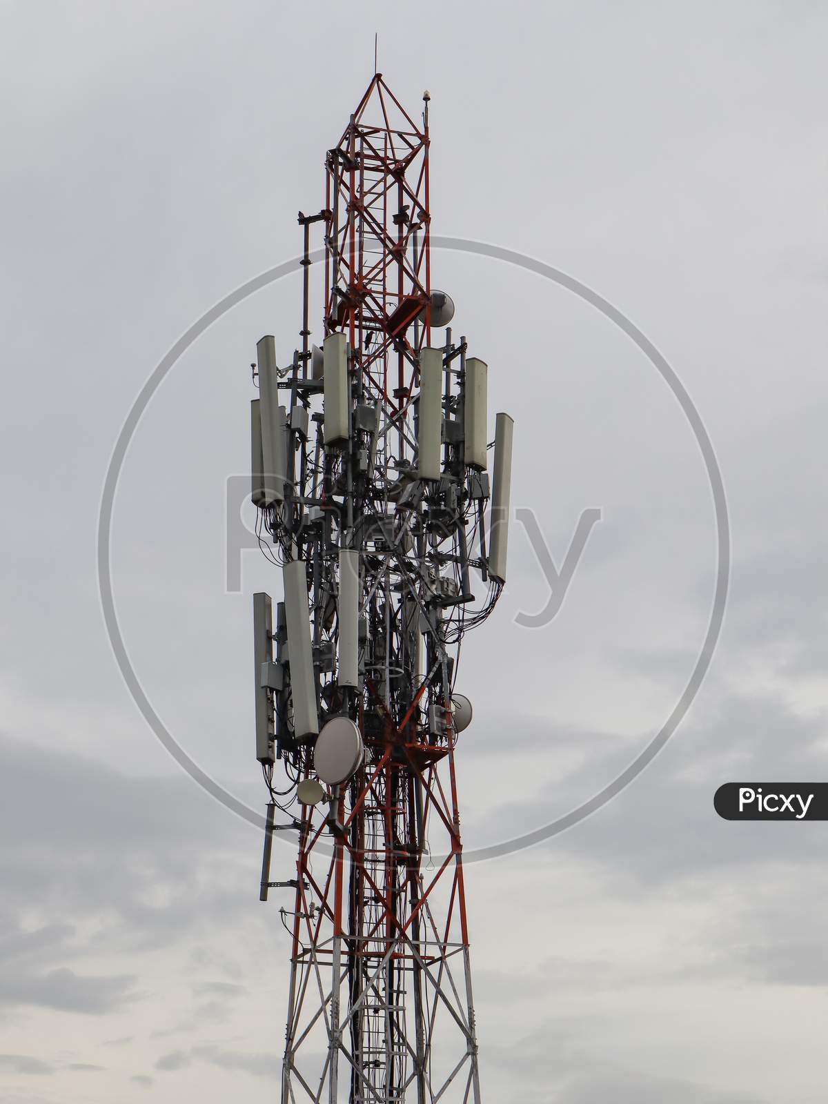 Mobile telecommunication tower or cell tower with antennae and electronic communications equipments.