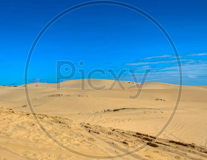 Mui Ne'S Sand Dunes And Clear Sky In Viet Nam