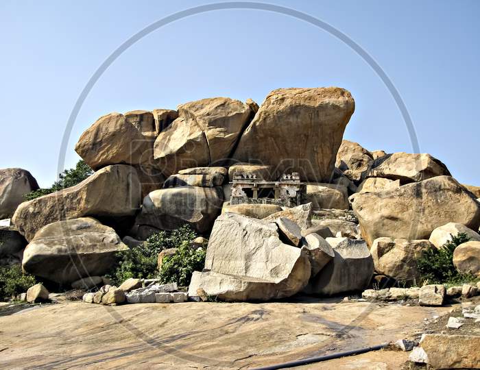 Ancient Stone Temples In Solid Rocks On Hill In Hampi, Karnataka, India.