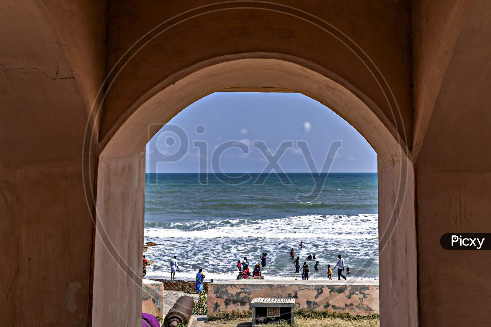 Tranquebar, Tamil Nadu, India-January 27th, 2019: View of the tourists enjoying sea through window of fort Dansborg, locally called Danish Fort.