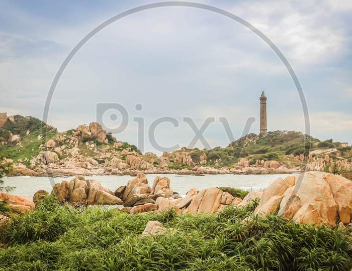 Ke Ga Lighthouse And Beauty Rocks On The Shoreline In Phan Thiet, Binh Thuan, Vietnam