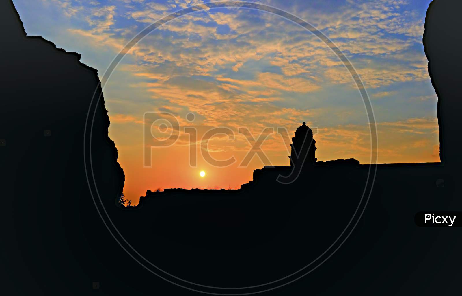 Beautiful Sunset Behind Badami Fort In Karnataka, India