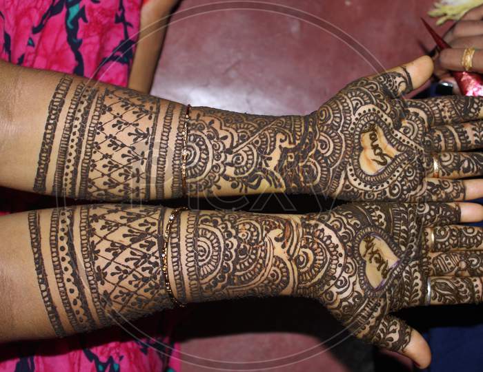 Mehandi Design In Girl Hand In Bridal Marriage Party.