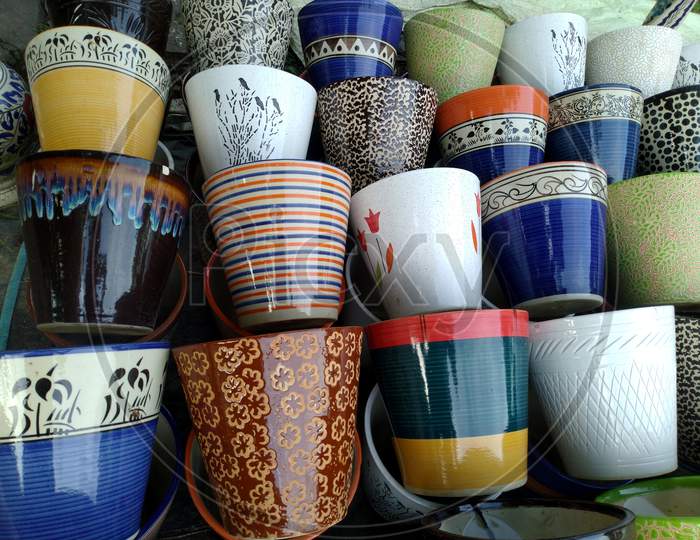 Closeup Of Various Painted Ceramic Pots For Sale At A Street Near Kolkata