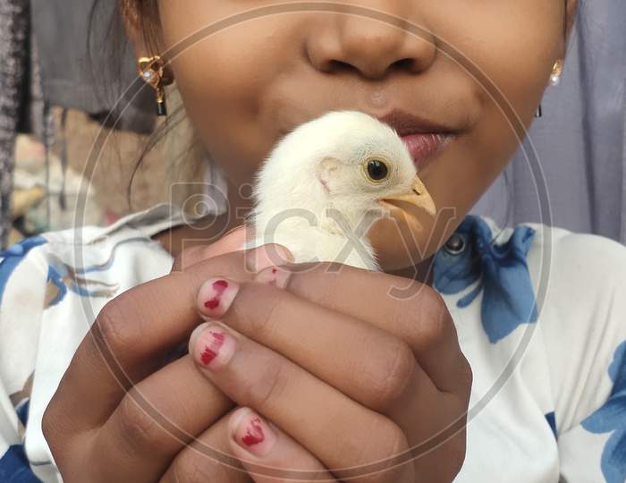 Cute Baby with Chick